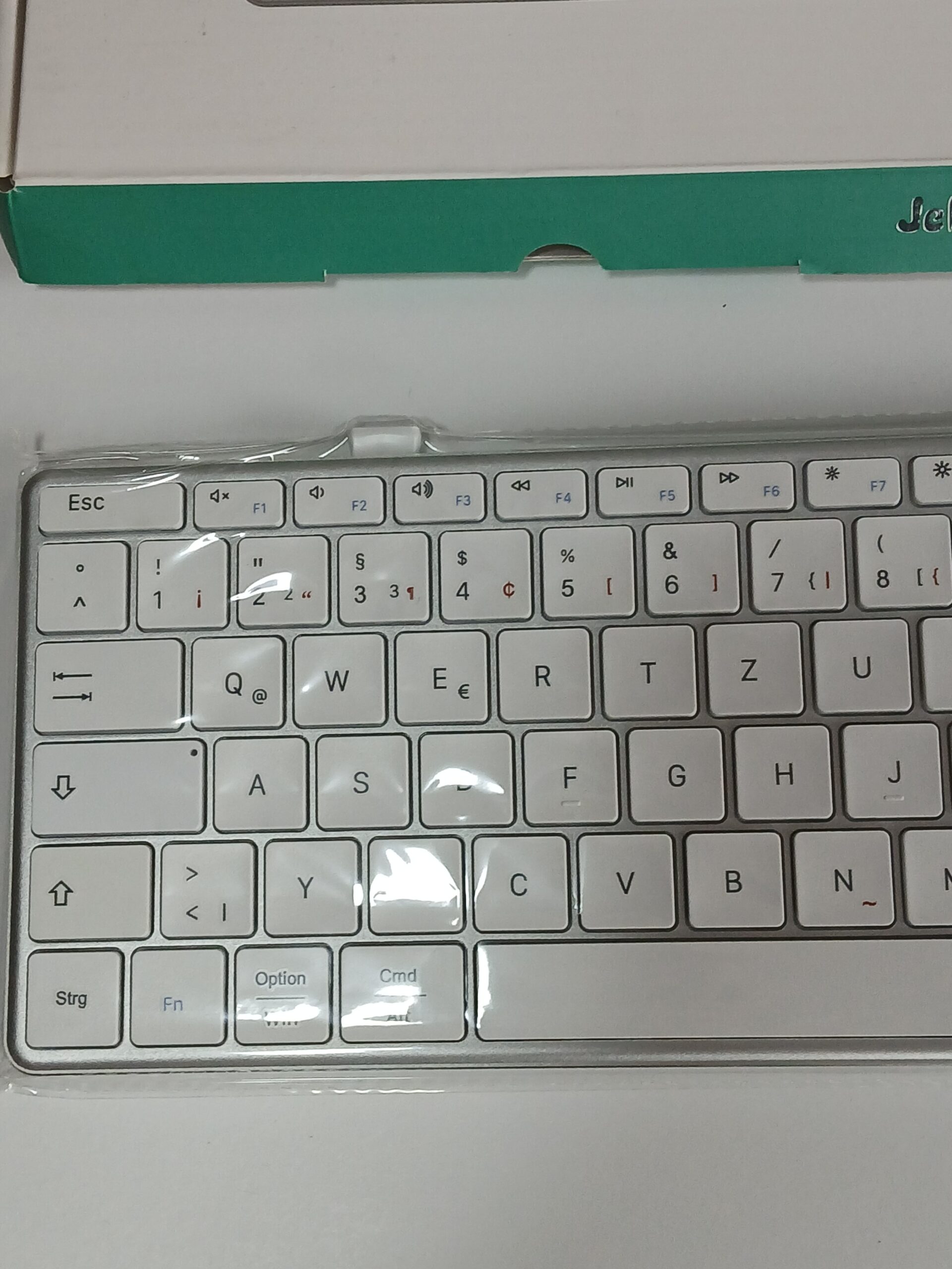 Klawiatura bezprzewodowa Jelly Comb 2.4G metalowa ultra slim nakładka silikonowa - obrazek 2